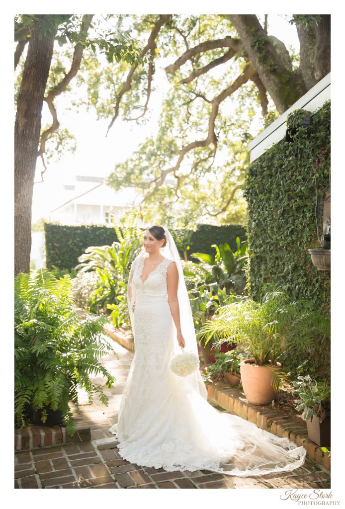 Bride in lace overlay gown at Mary Mahoney's in Biloxi for Bridal Portraits