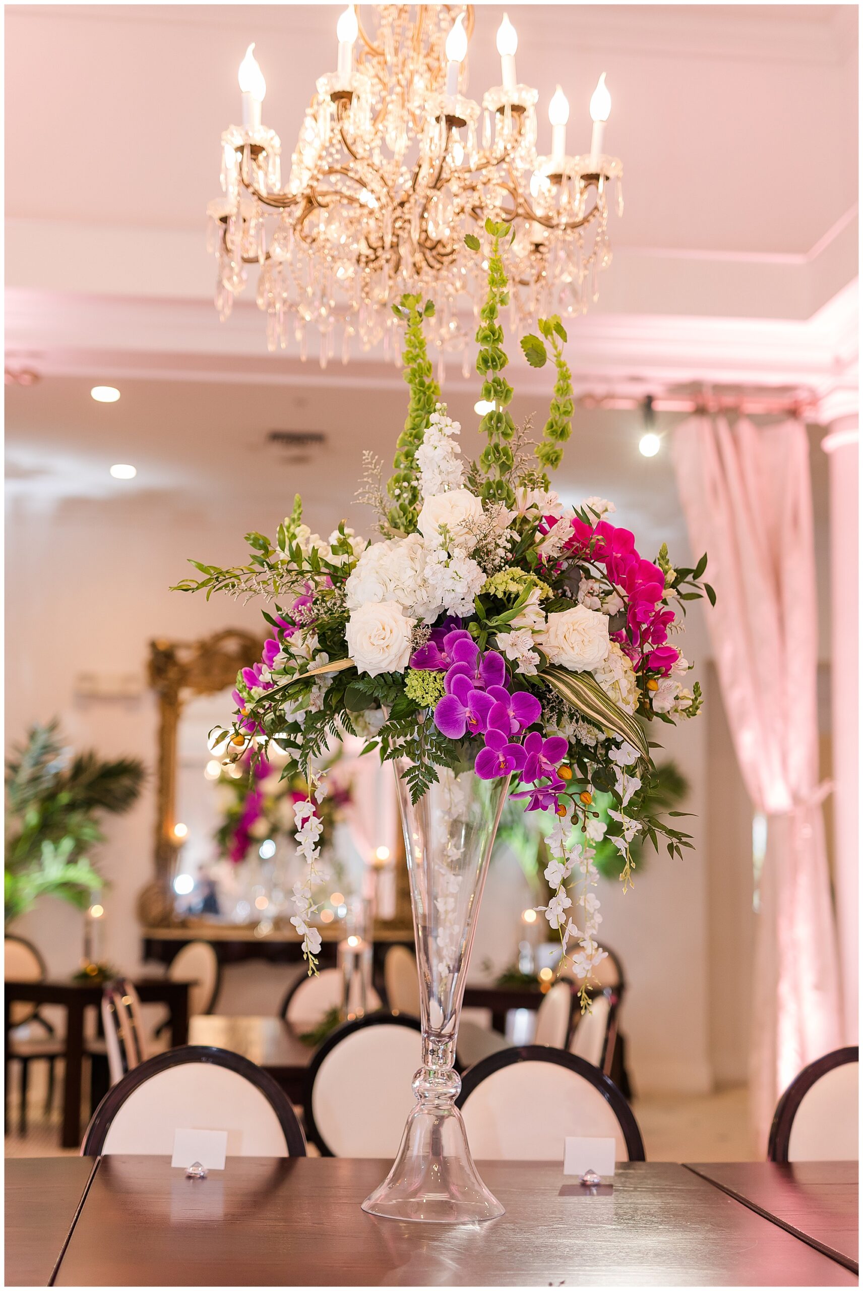 Wedding at White Pillars Biloxi with floral centerpiece